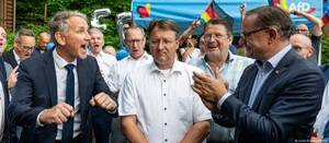 Björn Höcke, Robert Sesselmann, Tino Chrupalla and others celebrating