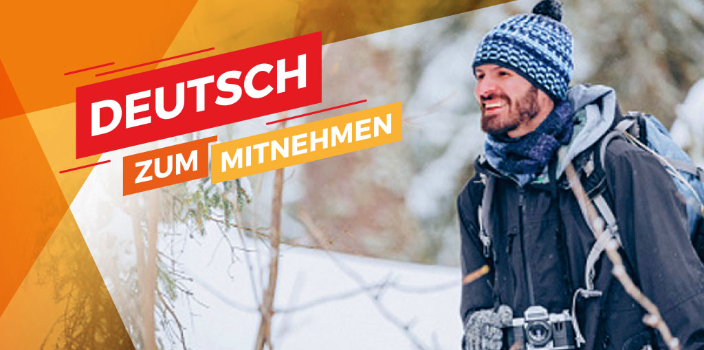 Eine Person steht mit einem Fotoapparat in einer winterlichen Landschaft, daneben der Schriftzug "Deutsch zum Mitnehmen"